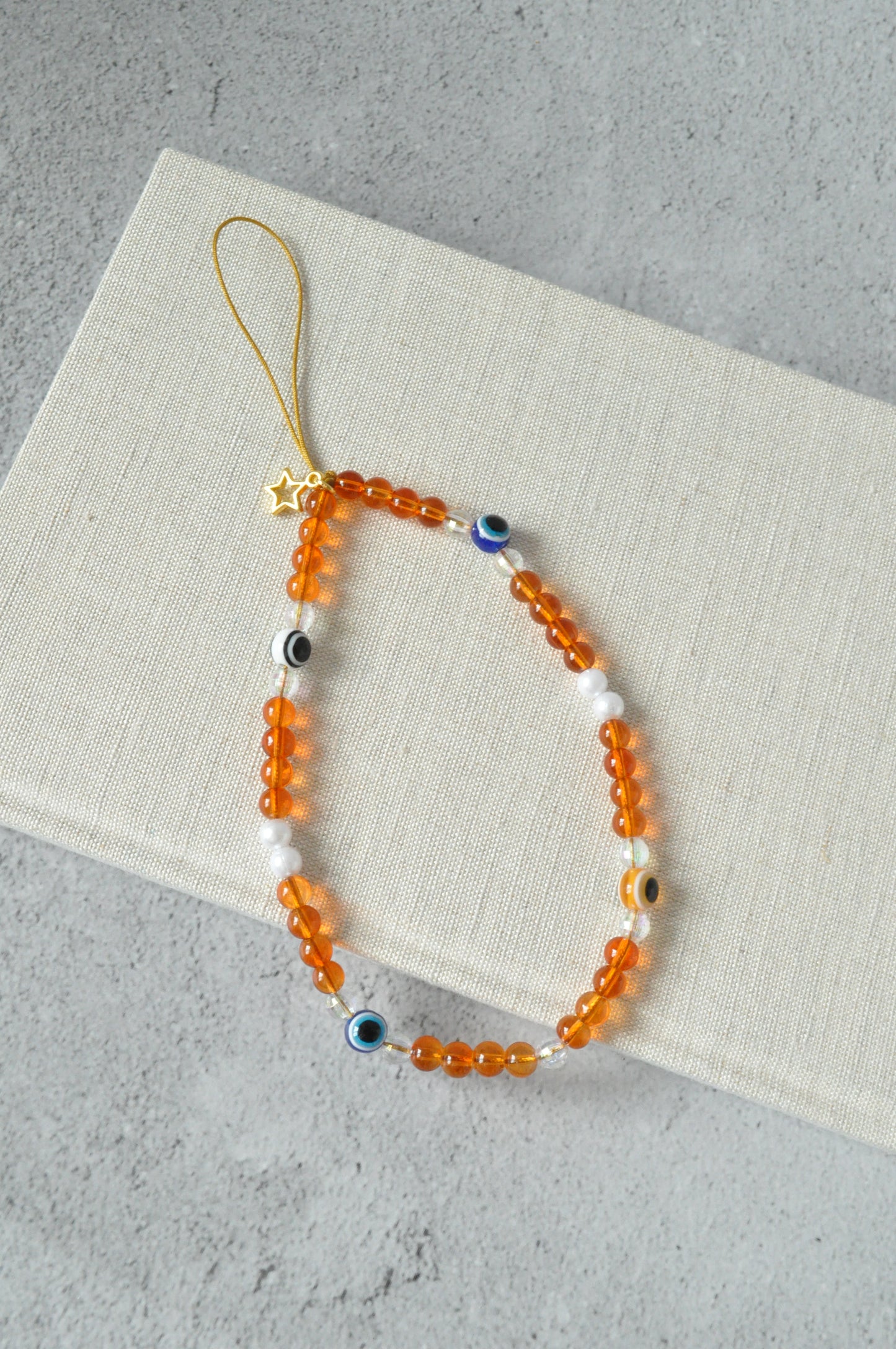 Amber Glass Bead Evil Eye Phone Charm