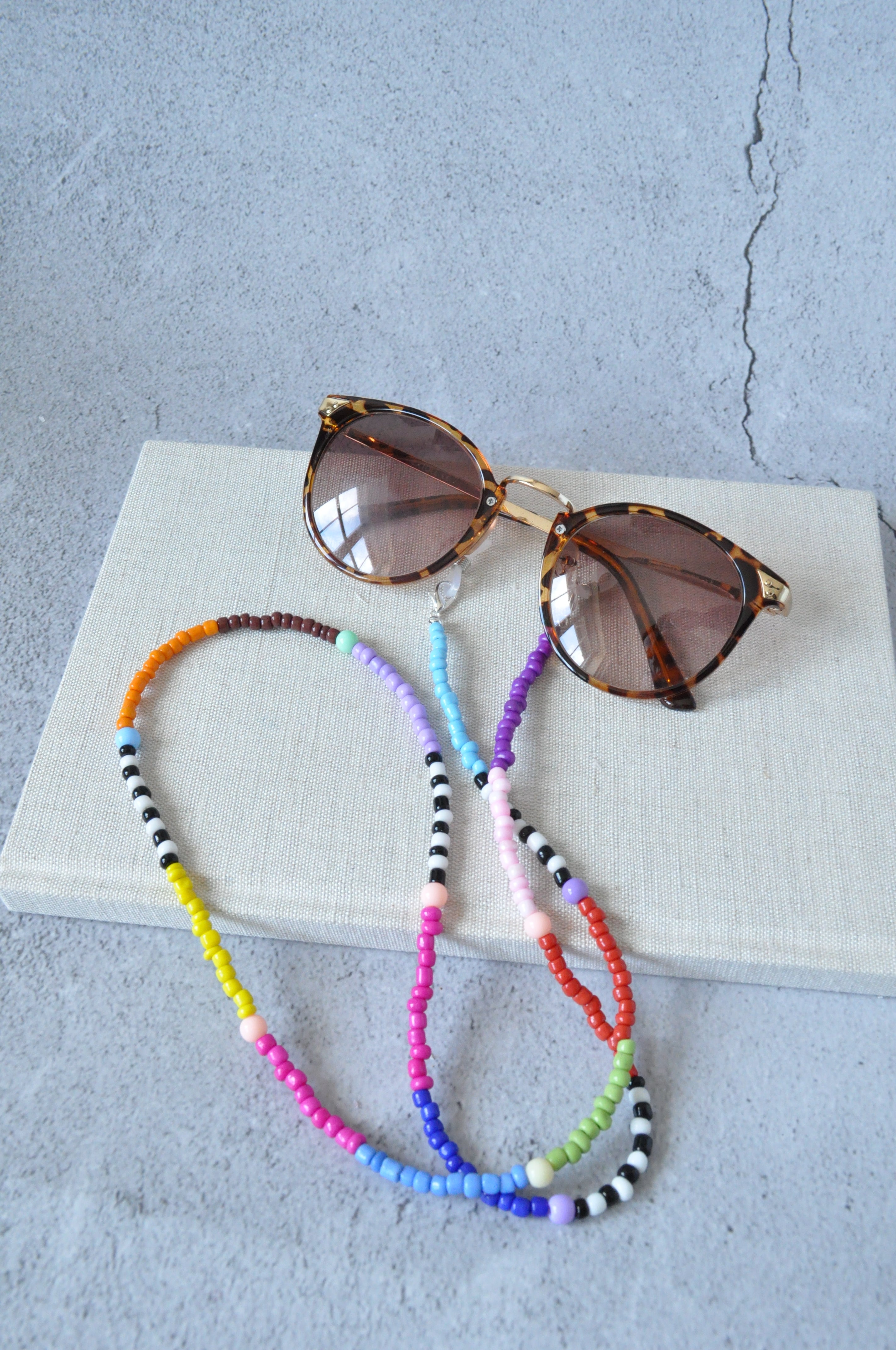 Beaded glasses string online